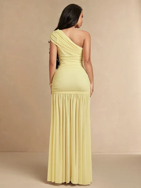 Robe longue jaune dos nu, haut bandeau, maille et coupe ajustée