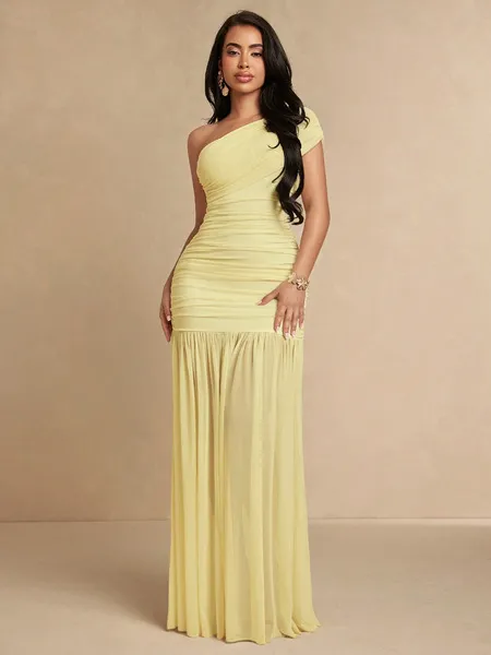 Robe longue jaune dos nu, haut bandeau, maille et coupe ajustée