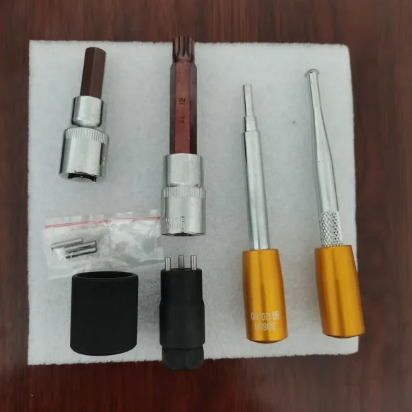Kit démontage injecteur diesel common rail, vue des douilles, outils à manche et accessoires