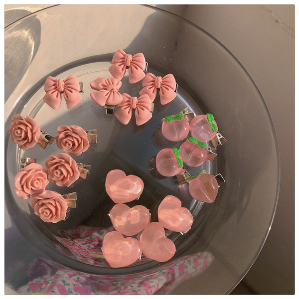 Pince à cheveux décorative fleur camélia et nœud rose pour femme