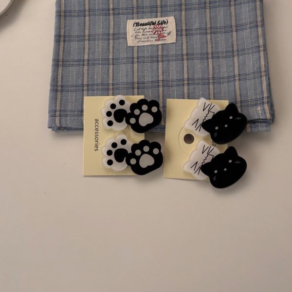 Pince à cheveux griffe de chat en acrylique noir et blanc pour femme